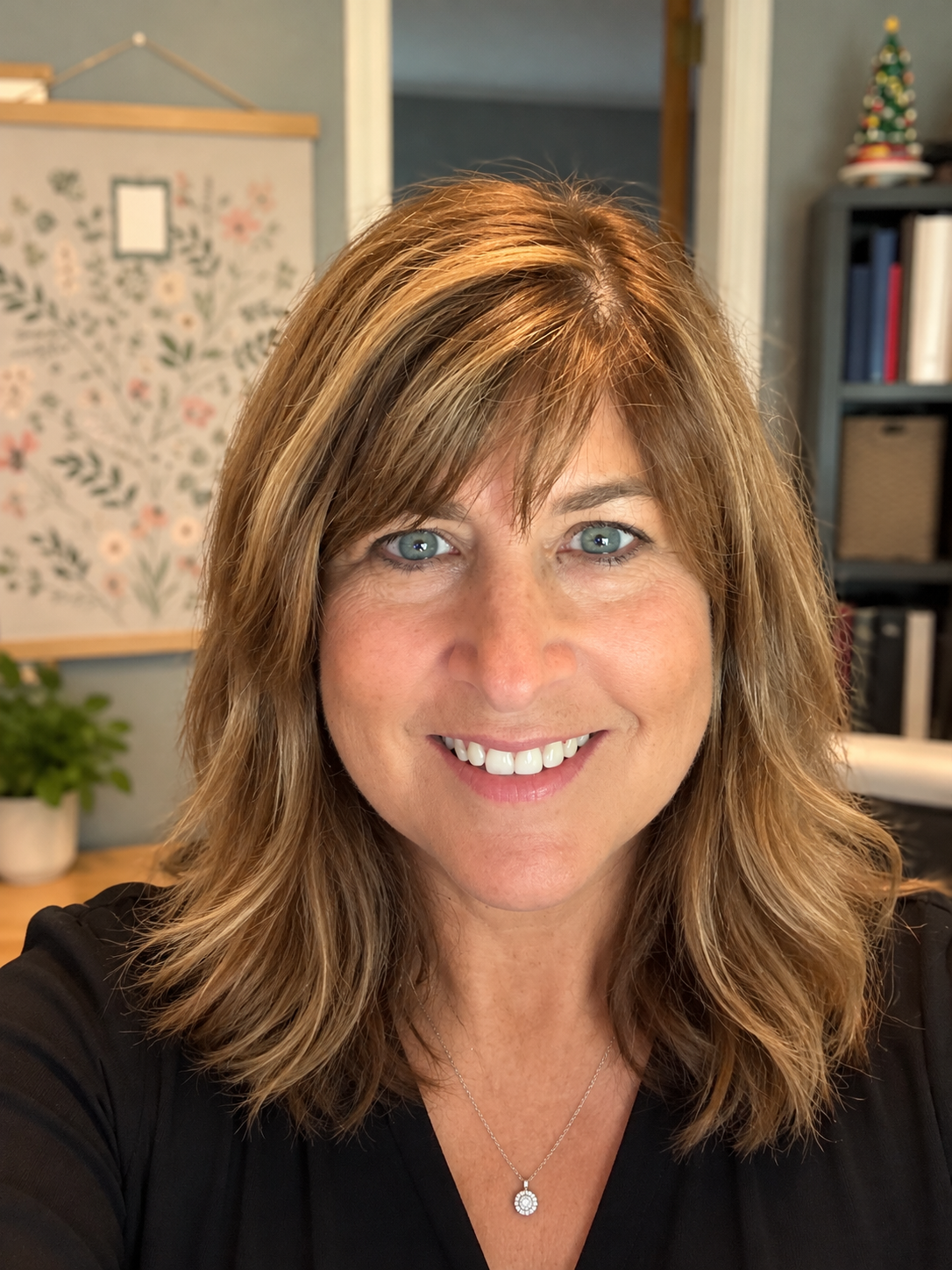 Woman smiling at a selfie